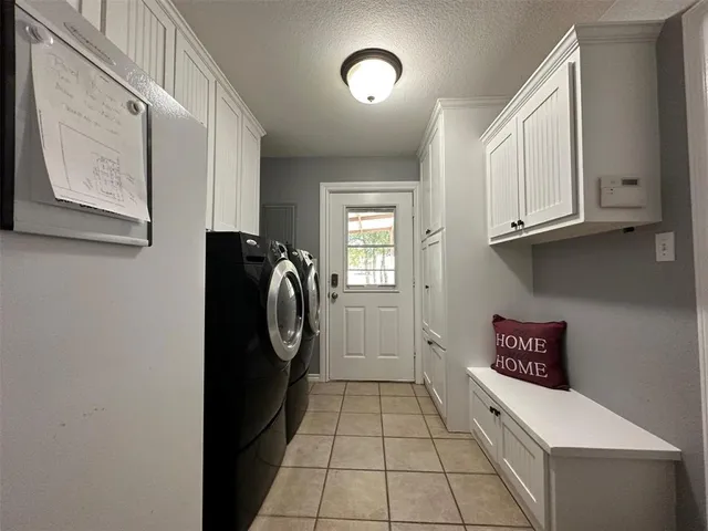 a outdoor space with a fireplace and a couch