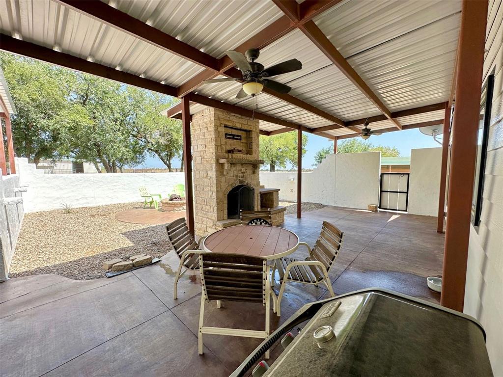 2901 Wind Mill Court Tolar, TX 76476 - Photo 22 of 38 a view of a porch with furniture and a yard
