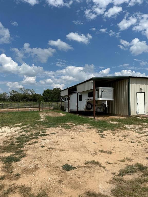2901 Wind Mill Court Tolar, TX 76476 - Photo 26 of 38 a view of a house with a yard