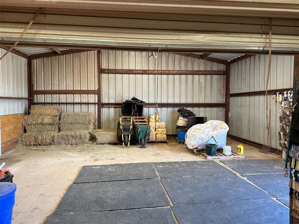 2901 Wind Mill Court Tolar, TX 76476 - Photo 28 of 38 a car parked in a garage