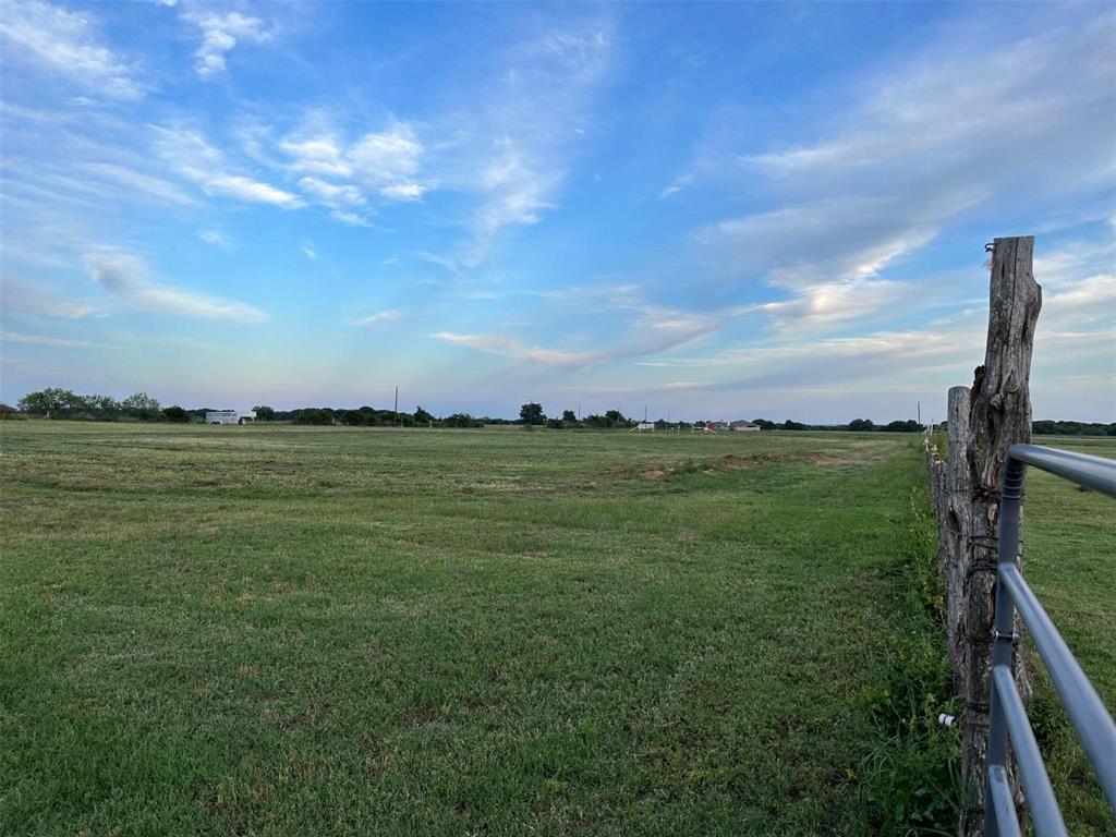 2901 Wind Mill Court Tolar, TX 76476 - Photo 35 of 38 a view of a field with an ocean