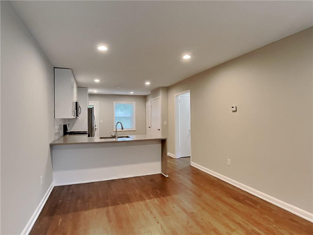 224 Buchanan Terrace Decatur, GA 30030 - Photo 11 of 23 a view of kitchen with wooden floor
