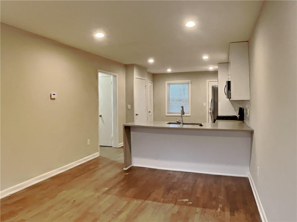 224 Buchanan Terrace Decatur, GA 30030 - Photo 3 of 23 a view of kitchen with wooden floor