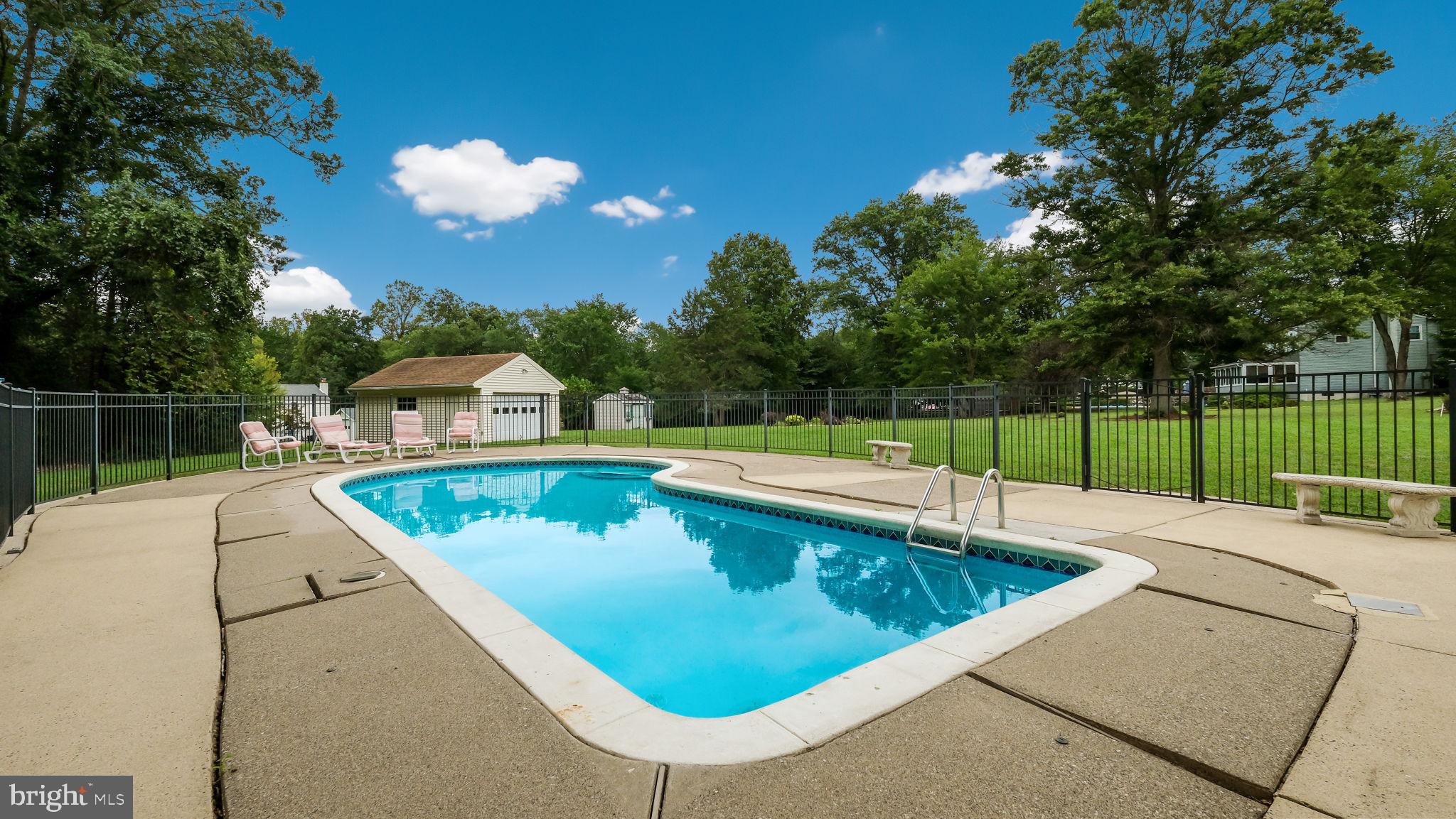 1440 Turk Road Warrington, PA 18976 - Photo 36 of 37 a view of a swimming pool with a patio and a yard