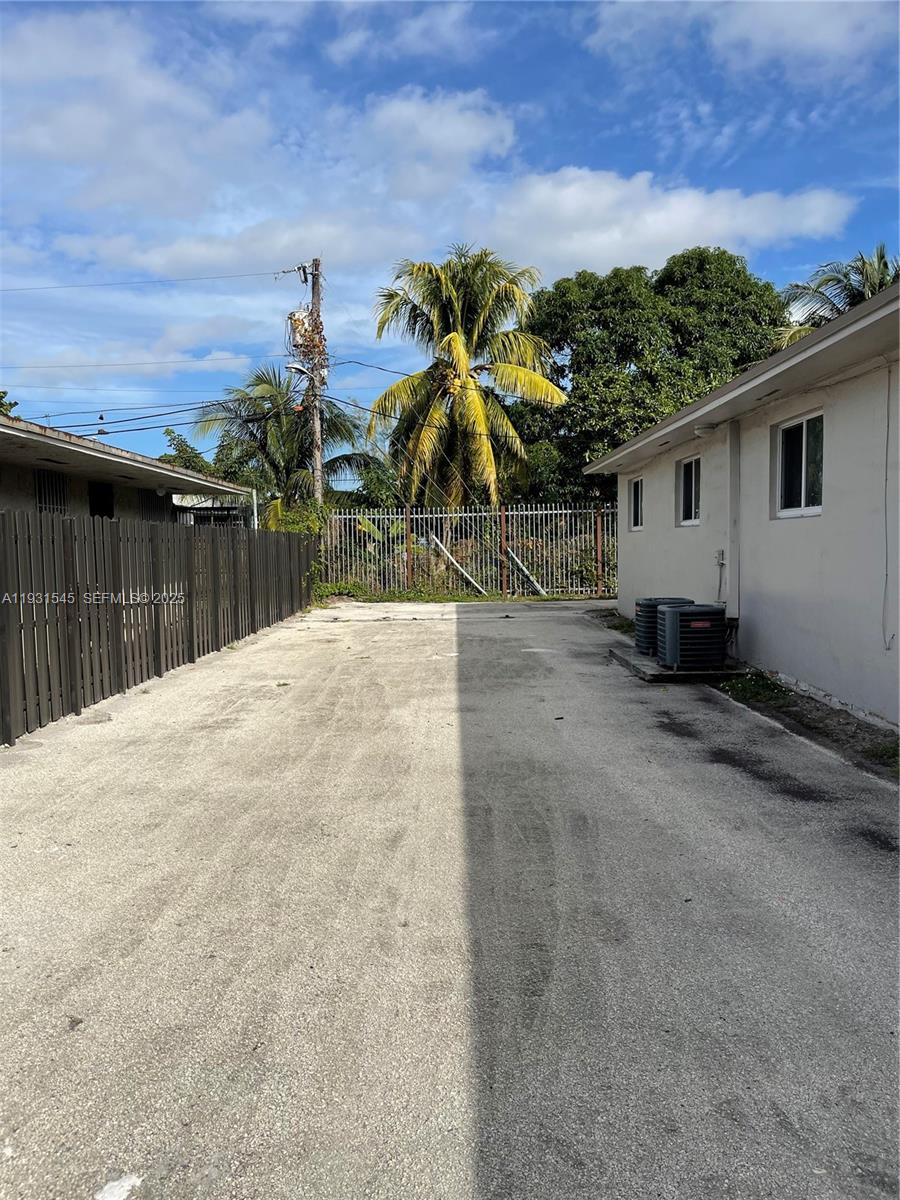 3031 Northwest 134th Street, Unit 1 Opa-Locka, FL 33054 - Photo 8 of 8 a view of a backyard