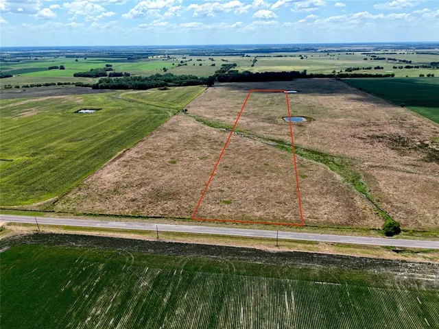 a view of swimming pool with a yard