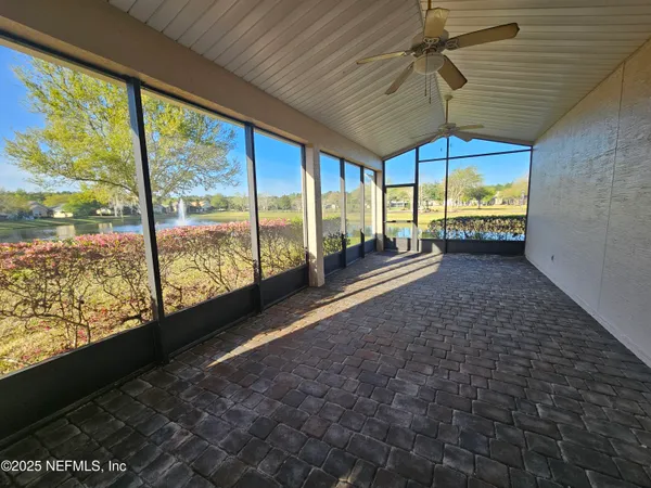 a view of a floor to ceiling window in an empty room
