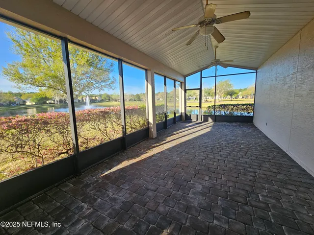 a view of a floor to ceiling window in an empty room