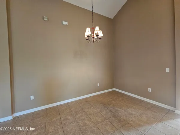 a view of a chandelier fan