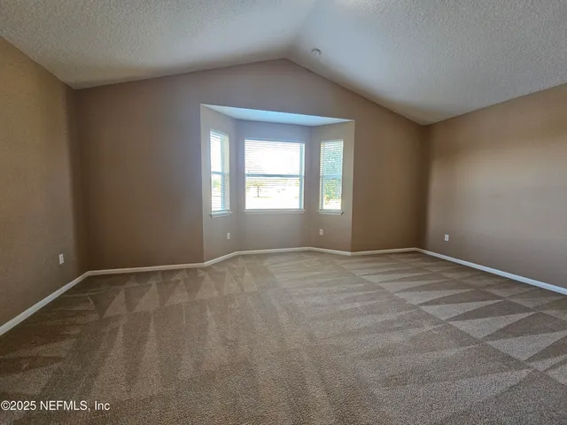 a view of empty room with window