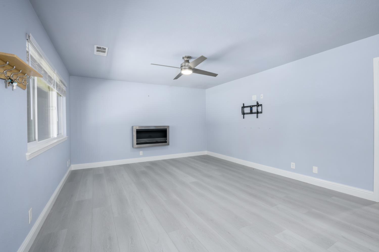 2873 Anderson Way Placerville, CA 95667 - Photo 6 of 24 wooden floor in an empty room with a window
