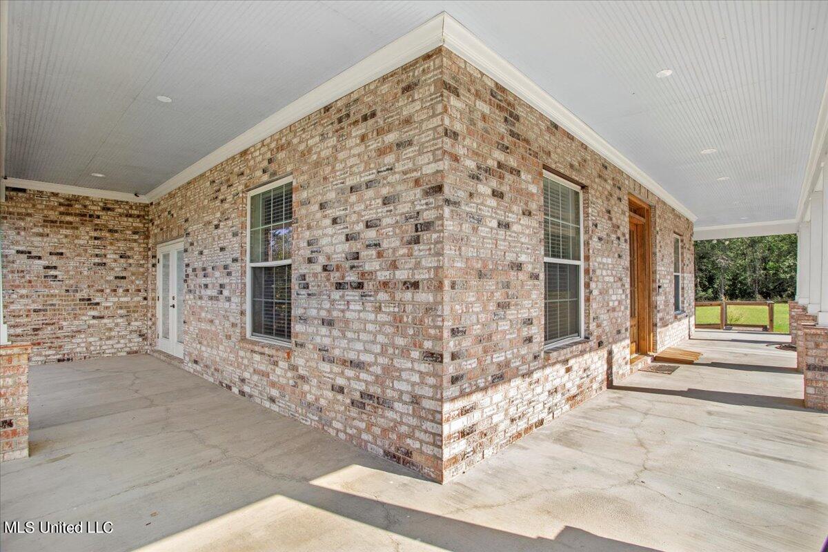 47 Mage Road Wiggins, MS 39577 - Photo 29 of 41 06-Side and Front Porch