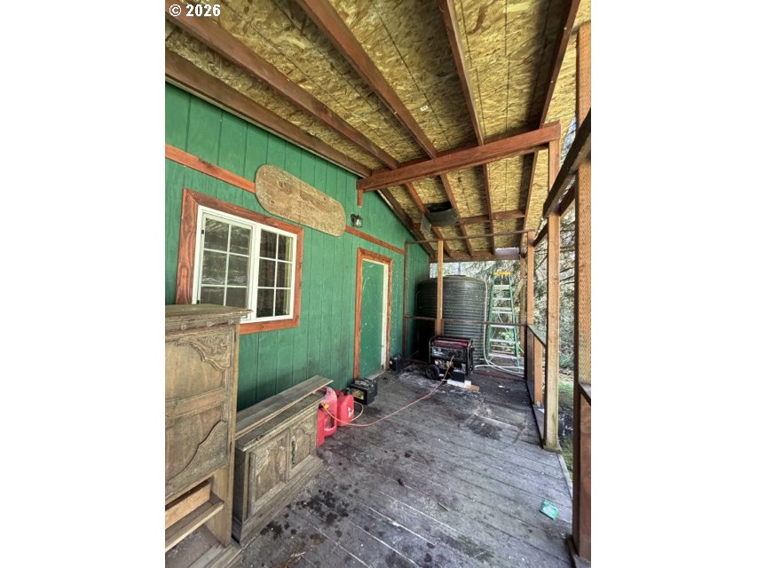 1499 Carlson Road Reedsport, OR 97467 - Photo 4 of 16 a view of porch with seating space