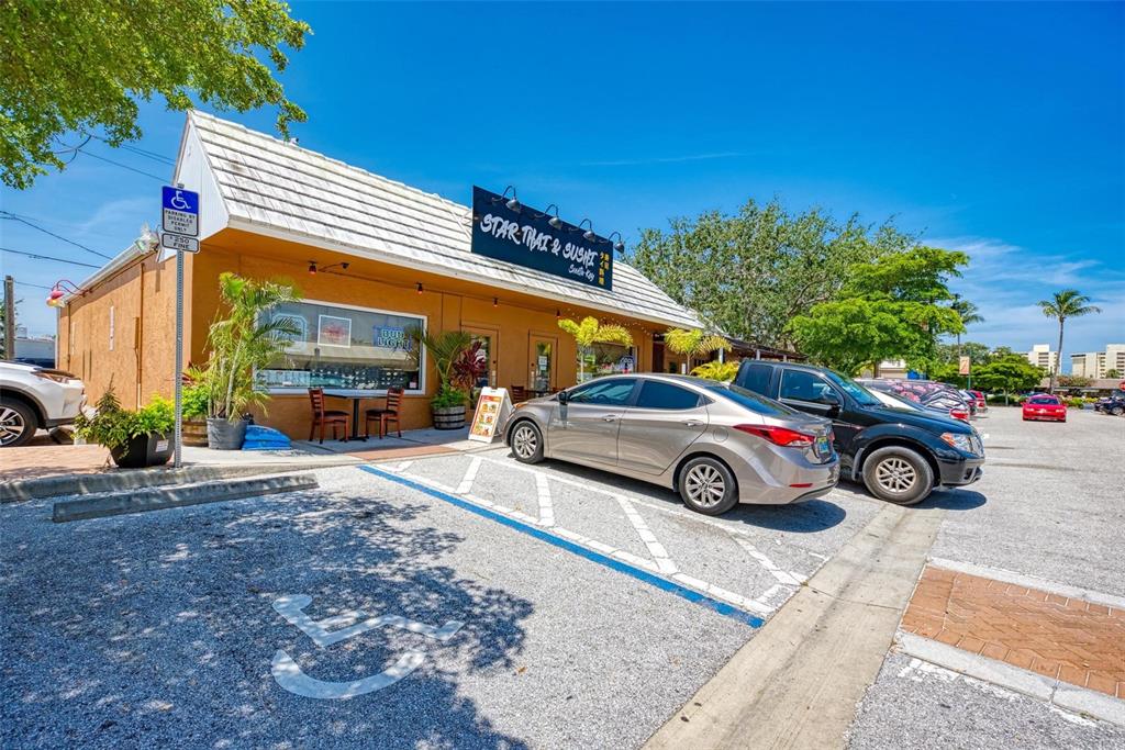 Ocean Boulevard Sarasota, FL 34242 - Photo 14 of 63 a car parked in front of a house