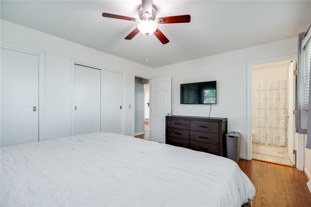 6950 Red Lion 5 Points Road Springboro, OH 45066 - Photo 30 of 78 This spacious bedroom offers ample storage, bright lighting, and a private ensuite for comfort.