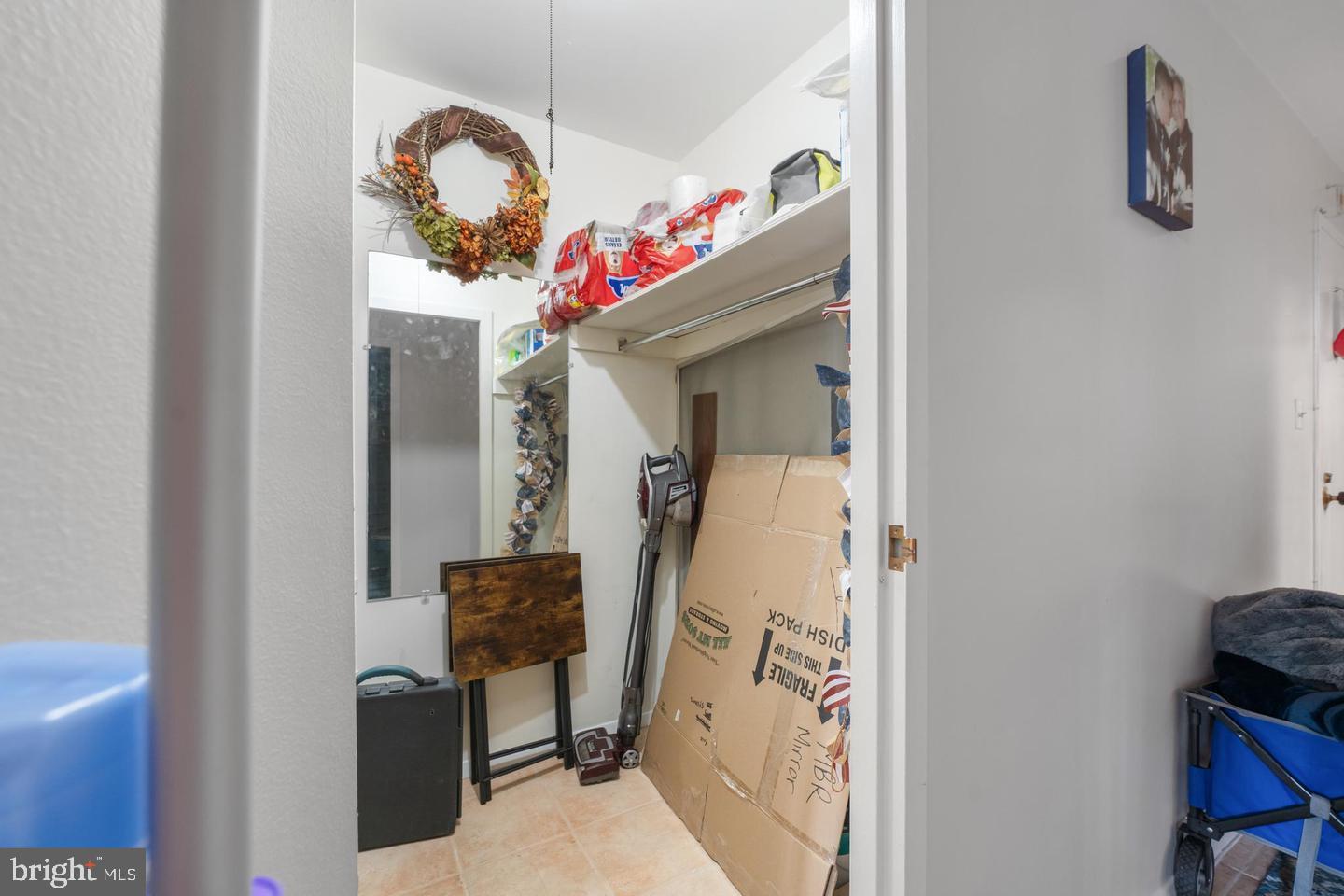 9701 Fields Road, Unit 1604 Gaithersburg, MD 20878 - Photo 12 of 26 Walk in closet off hallway, next to bedroom