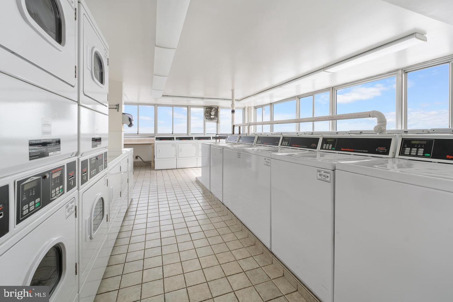 9701 Fields Road, Unit 1604 Gaithersburg, MD 20878 - Photo 15 of 26 In building laundry on penthouse floor
