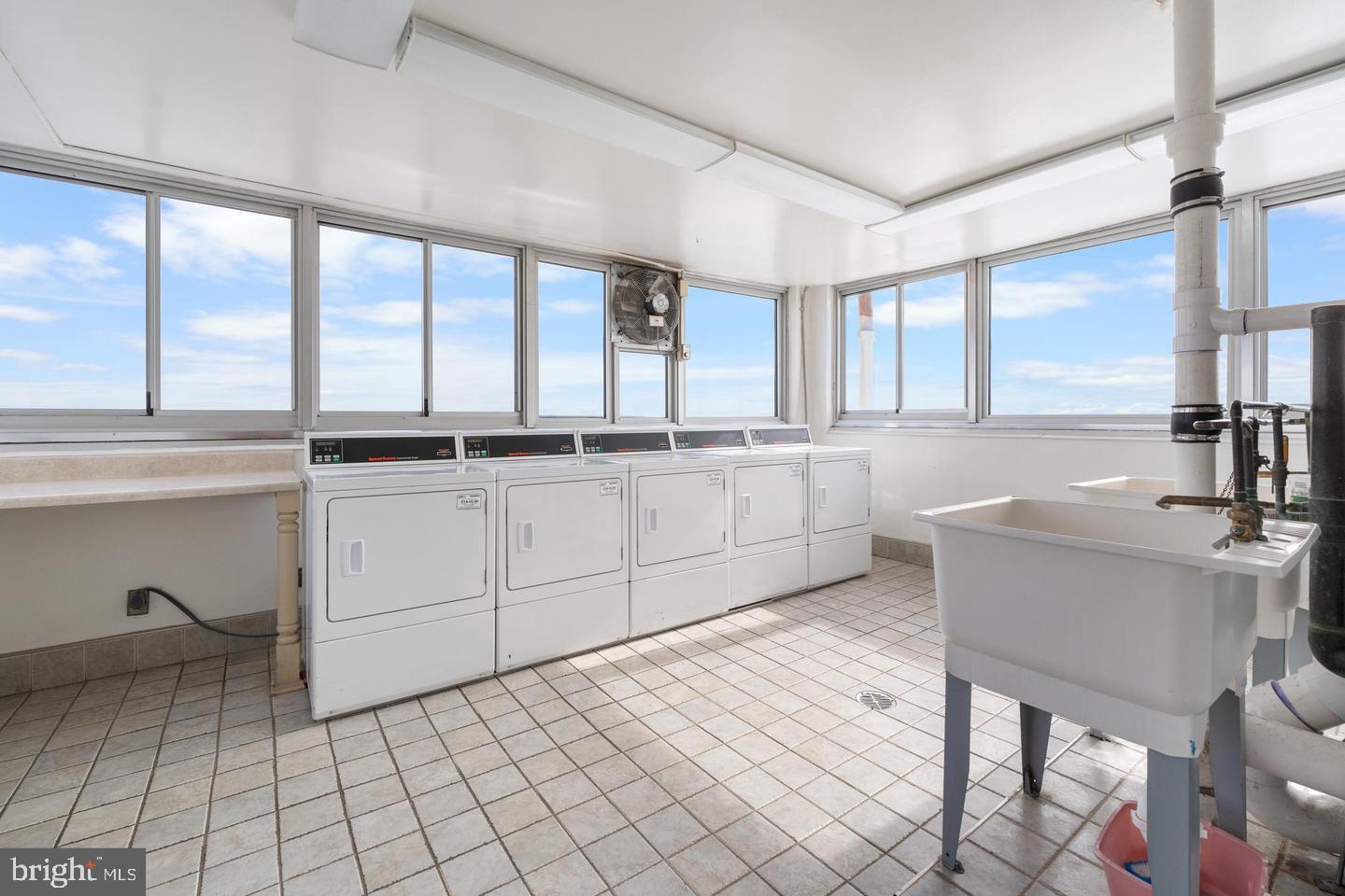 9701 Fields Road, Unit 1604 Gaithersburg, MD 20878 - Photo 16 of 26 Plenty of washers and dryers to share with others