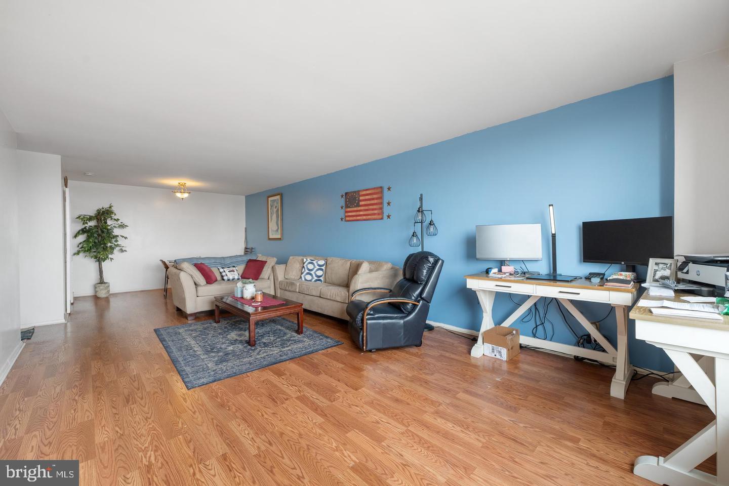 9701 Fields Road, Unit 1604 Gaithersburg, MD 20878 - Photo 2 of 26 View into living room and dining space