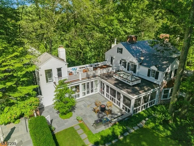 an aerial view of a house with a garden