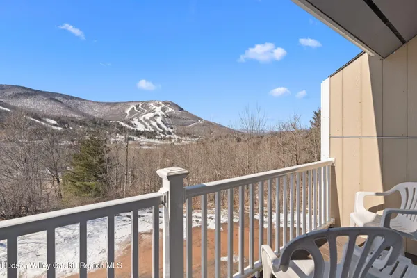 a view of a balcony with an outdoor space