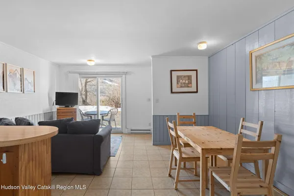 a kitchen with stainless steel appliances a stove a refrigerator and a refrigerator