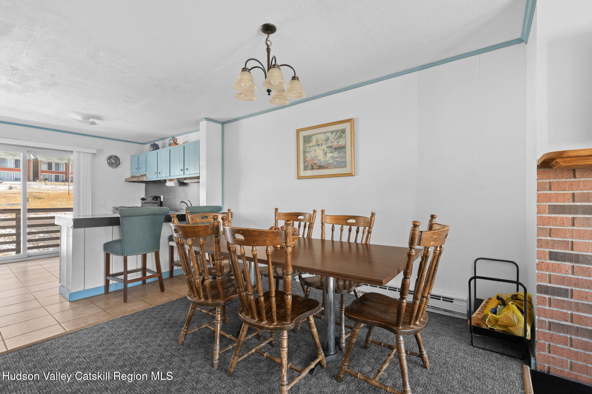 55 Scribner Hollow Road, Unit B4 Hunter, NY 12442 - Photo 9 of 39 a view of a dining room with furniture and window