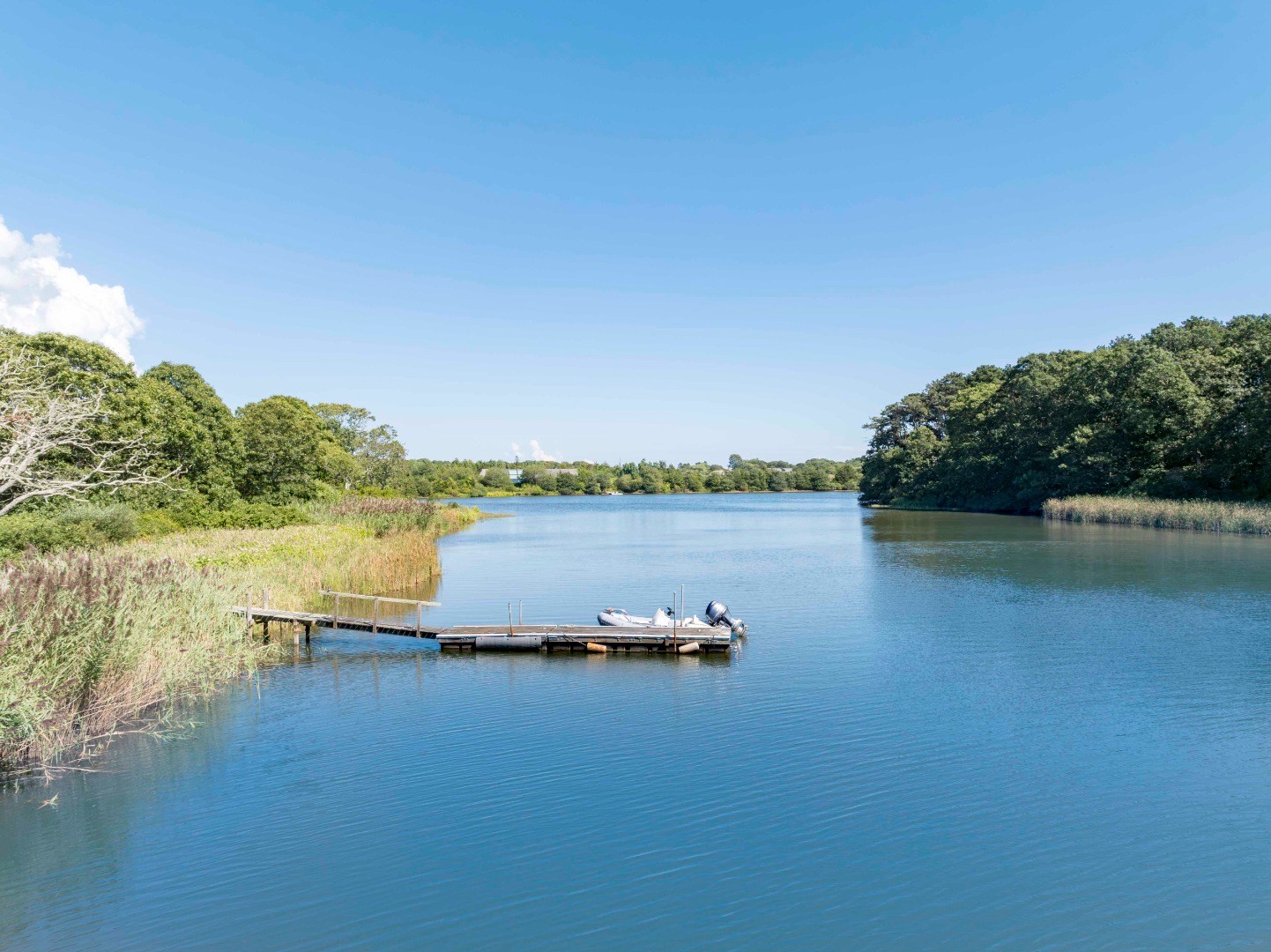 65 Carl's Way West Tisbury, MA 02568 - Photo 7 of 25 a view of a lake with a mountain in the background