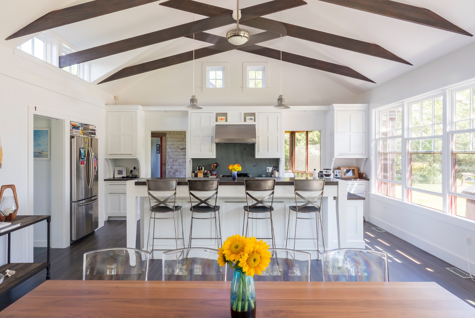 65 Carl's Way West Tisbury, MA 02568 - Photo 10 of 25 a living room with lots of furniture and a chandelier