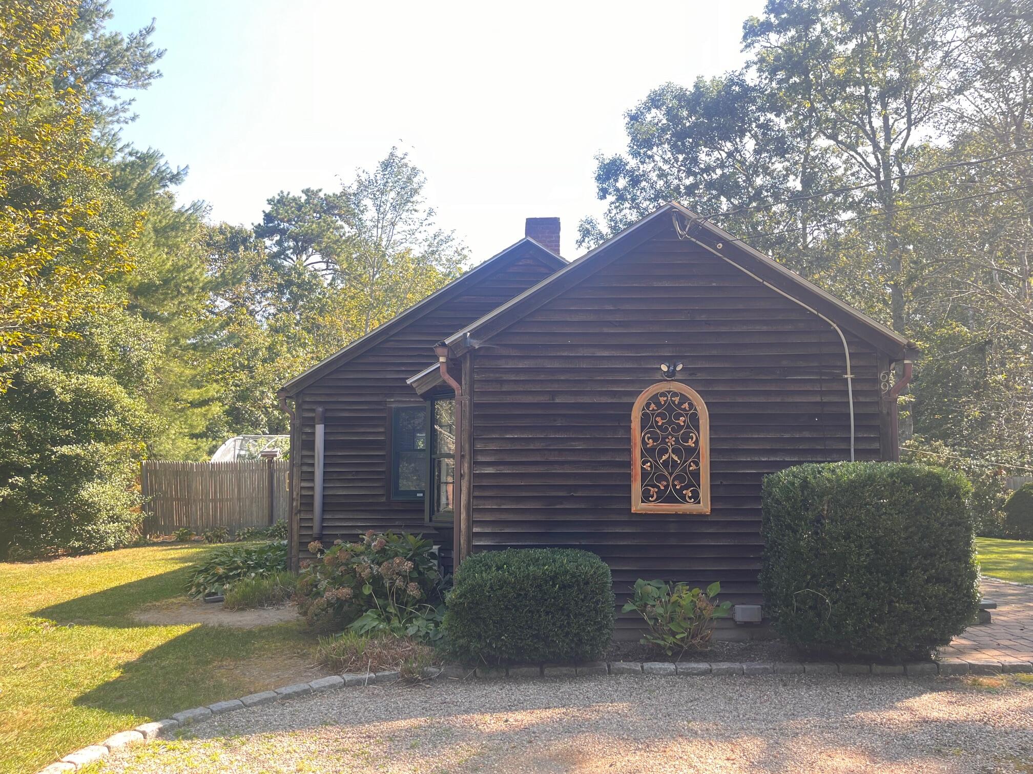 69 Beechwood Drive Mashpee, MA 02649 - Photo 34 of 44 SideViewofHouse