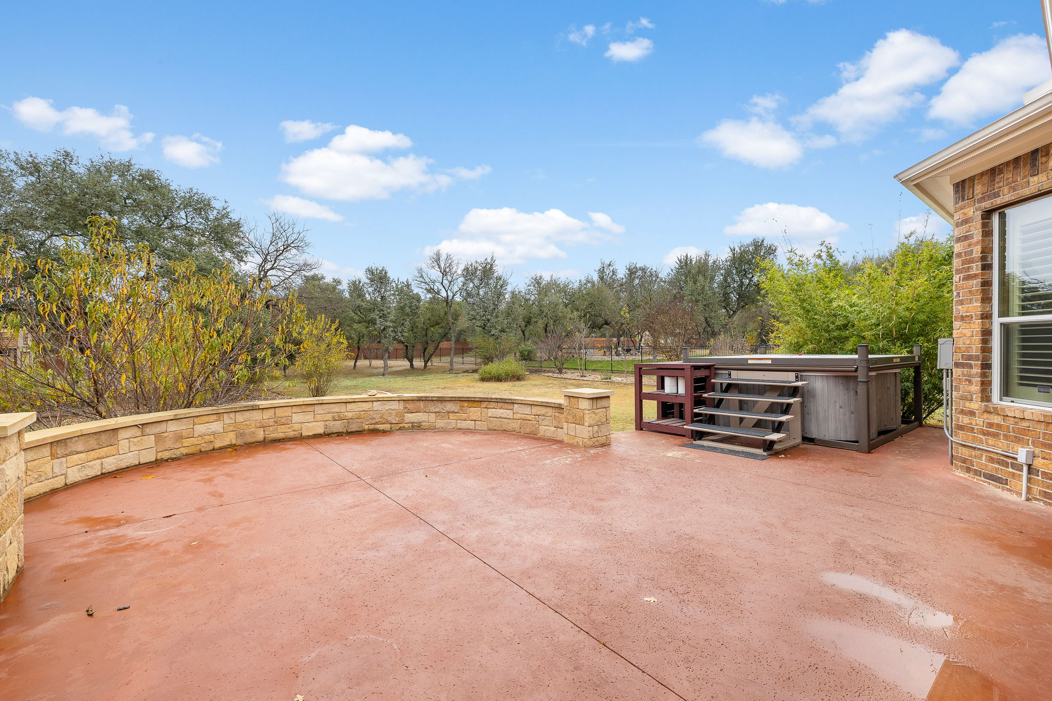 174 Estrella Crossing Georgetown, TX 78628 - Photo 32 of 38 View of patio featuring a jacuzzi