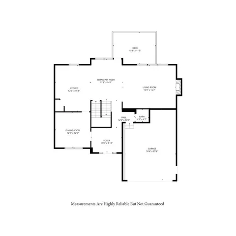 an empty room with wooden floor fireplace and windows