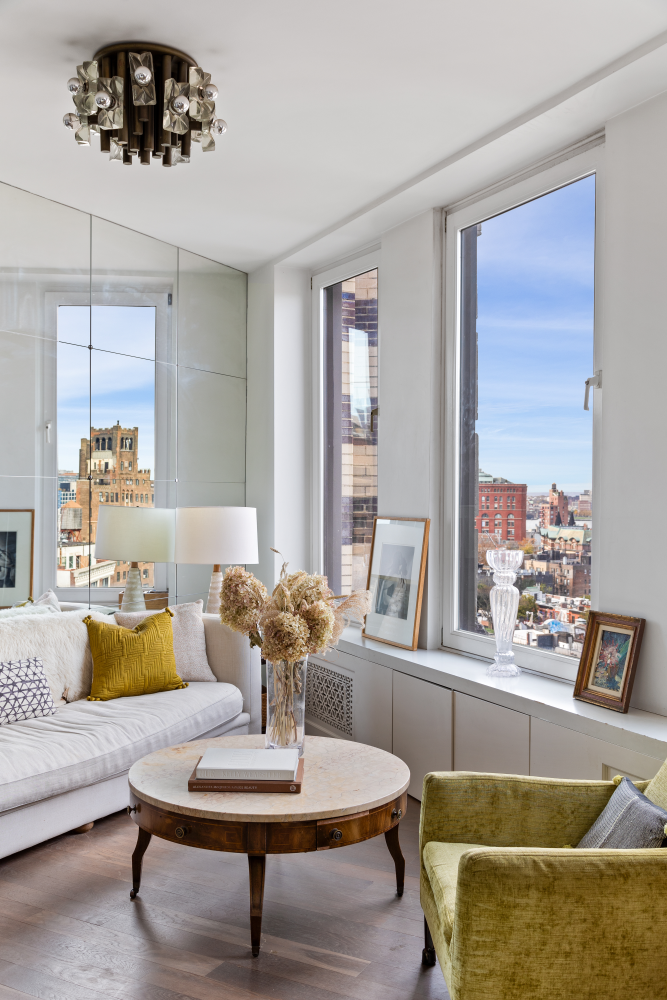 2 Cornelia Street, Unit PHA Manhattan, NY 10014 - Photo 3 of 11 a living room with furniture and a large window