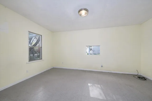 an empty room with a workbench