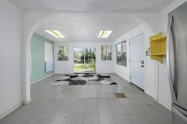 a view of a entryway door of the room