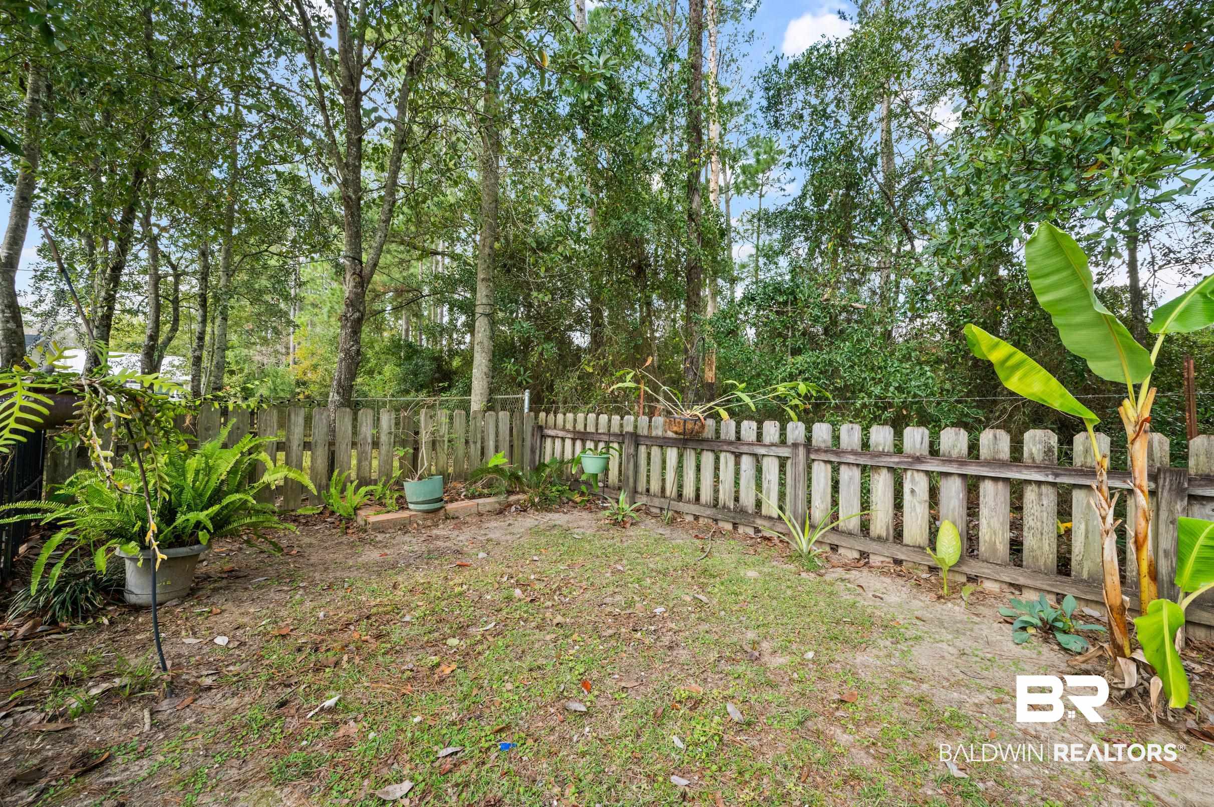 1192 Ridgewood Drive Lillian, AL 36549 - Photo 19 of 36 View of yard