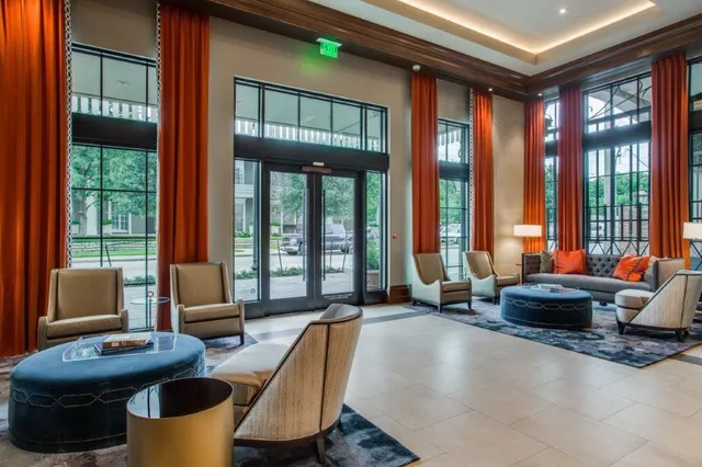 a view of a house with fountain in front of it