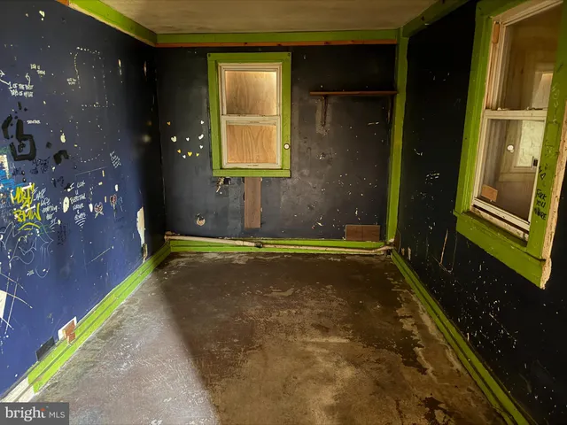 a view of a backyard of a house with a yard