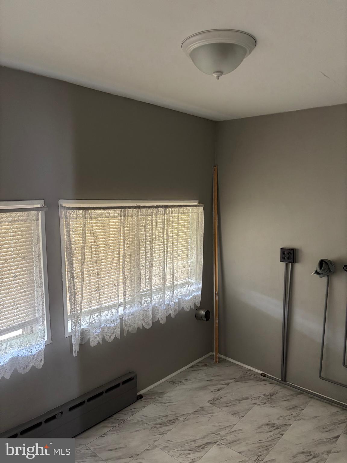 3167 East Thompson Street Philadelphia, PA 19134 - Photo 19 of 26 an empty room with windows