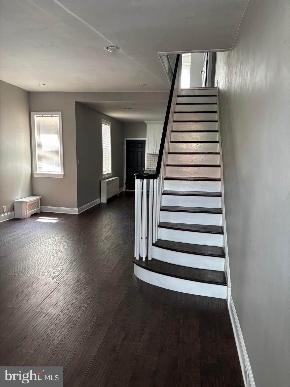 3167 East Thompson Street Philadelphia, PA 19134 - Photo 2 of 26 an empty room with wooden floor and windows