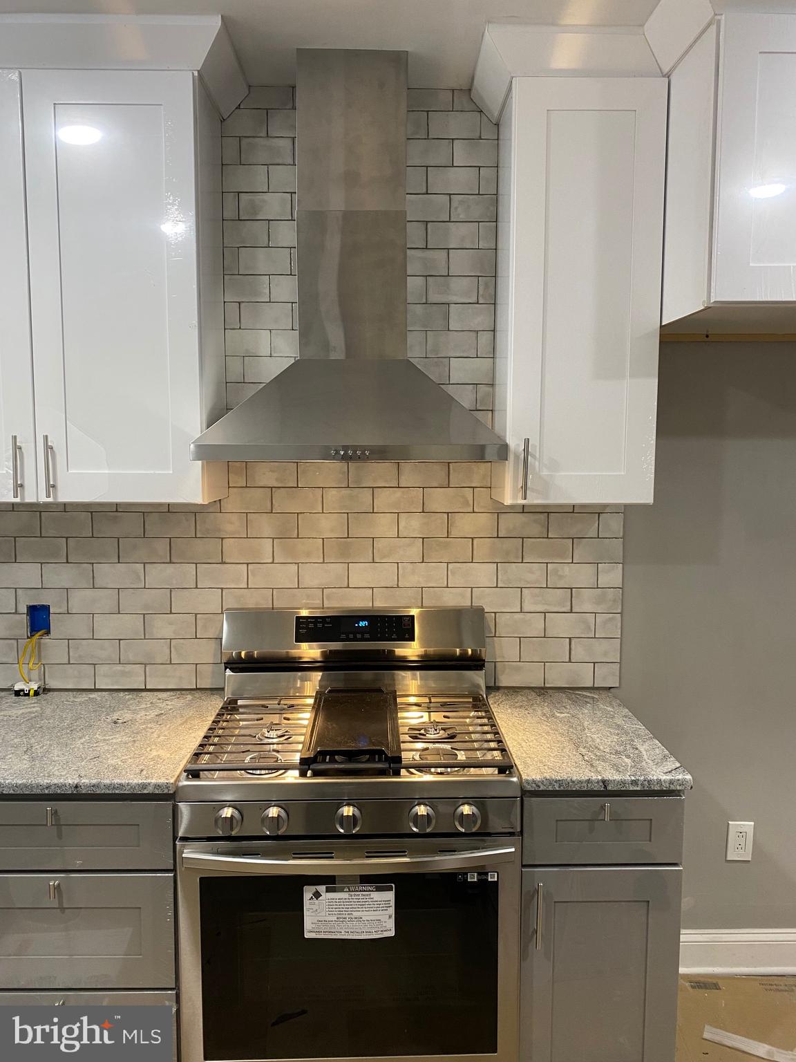 3167 East Thompson Street Philadelphia, PA 19134 - Photo 3 of 26 a stove top oven sitting inside of a kitchen