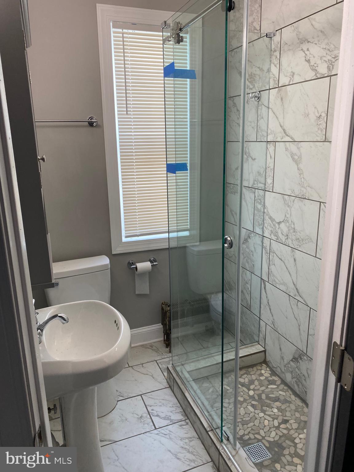 3167 East Thompson Street Philadelphia, PA 19134 - Photo 8 of 26 a bathroom with a sink toilet and shower