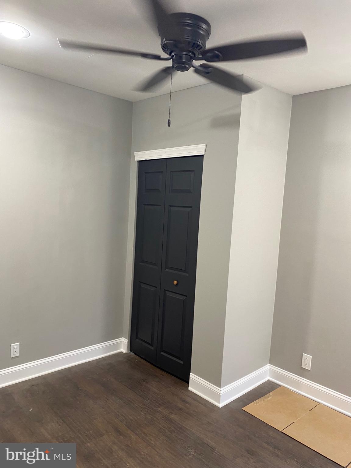 3167 East Thompson Street Philadelphia, PA 19134 - Photo 10 of 26 an empty room with wooden floor and fan