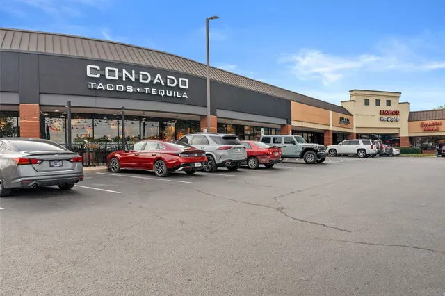 a car parked in front of a building