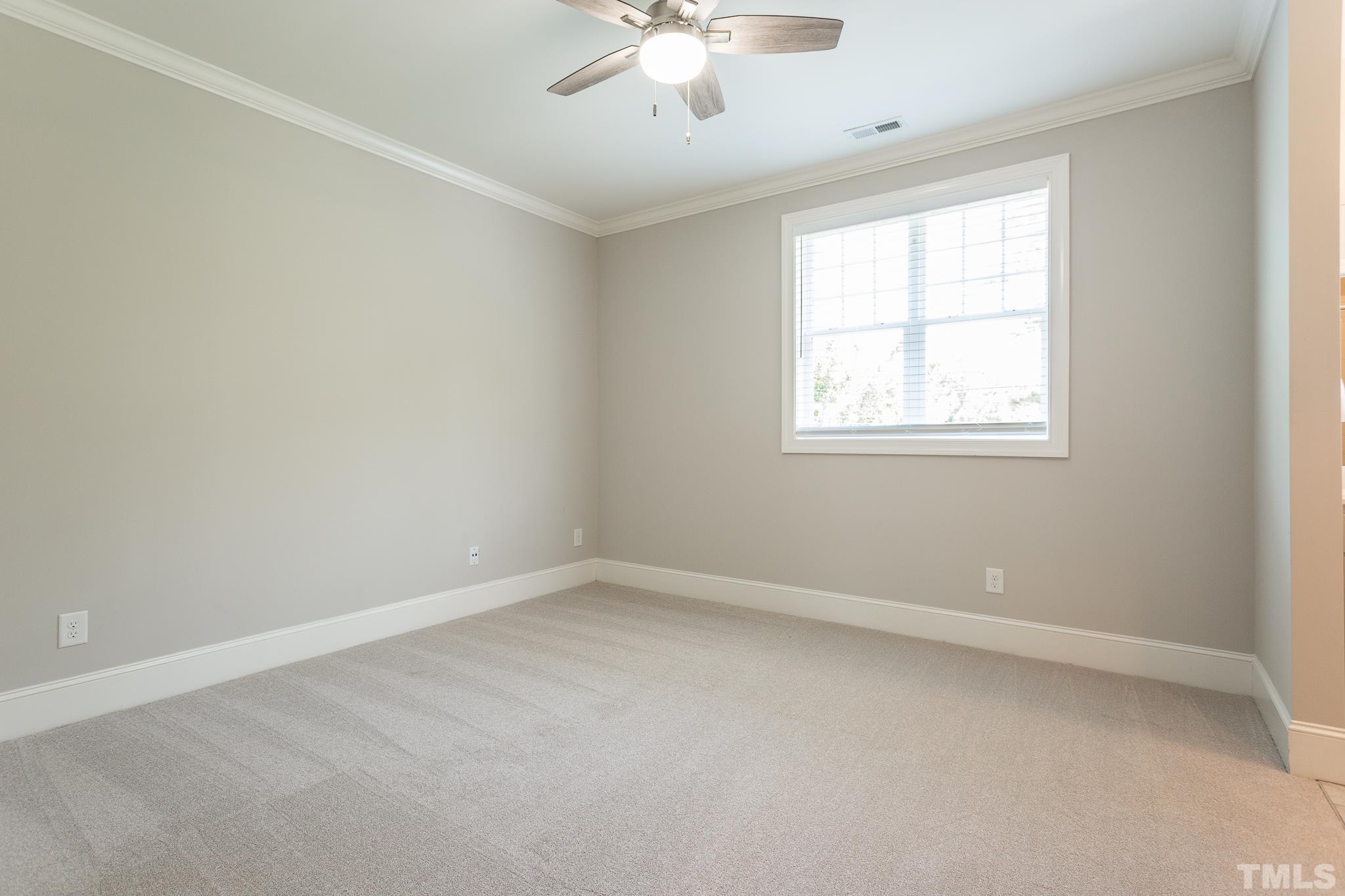 2824 Plumfield Place Raleigh, NC 27607 - Photo 13 of 21 an empty room with a window