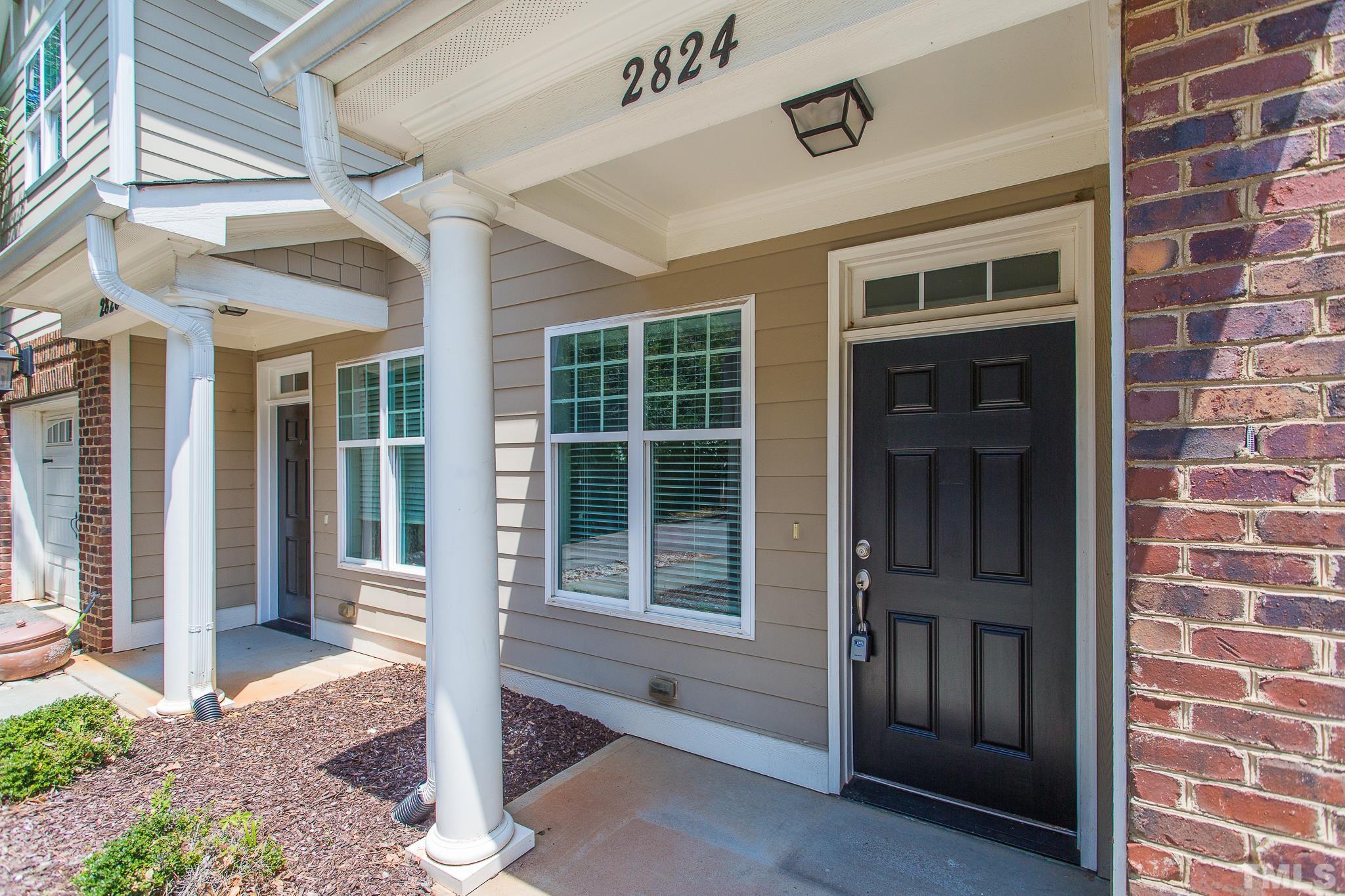 2824 Plumfield Place Raleigh, NC 27607 - Photo 19 of 21 a view of entrance front of a house