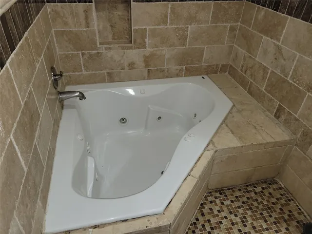 a bathroom with a bathtub
