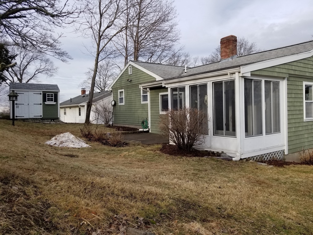 225 Governors Road, Unit 225 Quincy, MA 02169 - Photo 2 of 19 a view of a house with a yard