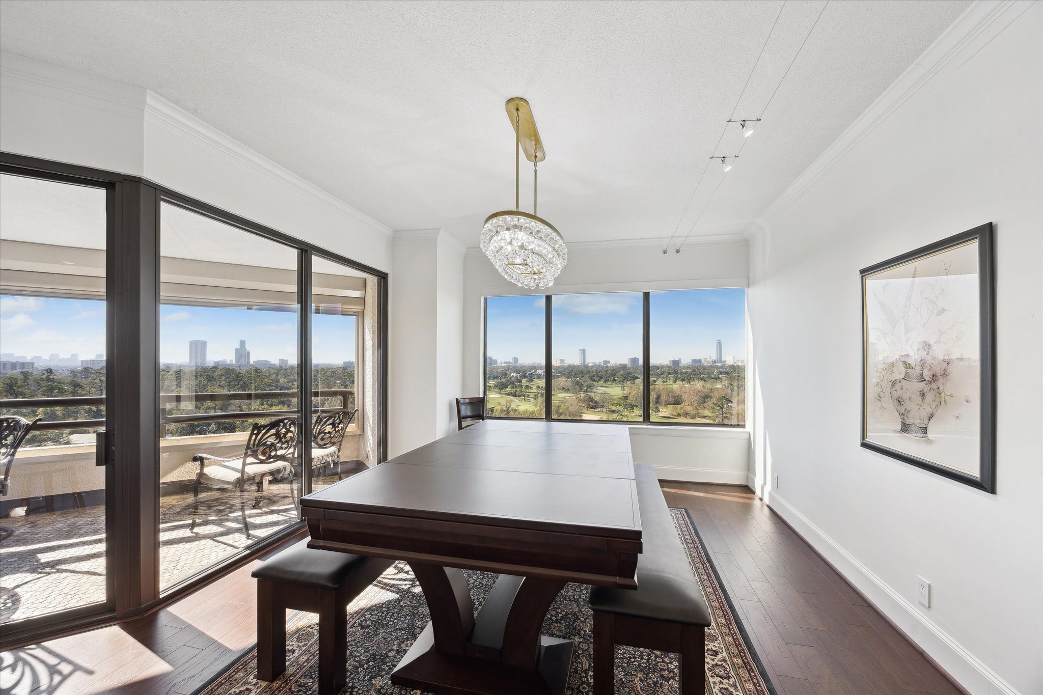 101 Westcott Street, Unit 1202 Houston, TX 77007 - Photo 12 of 38 a view of a dining room with furniture window and wooden floor