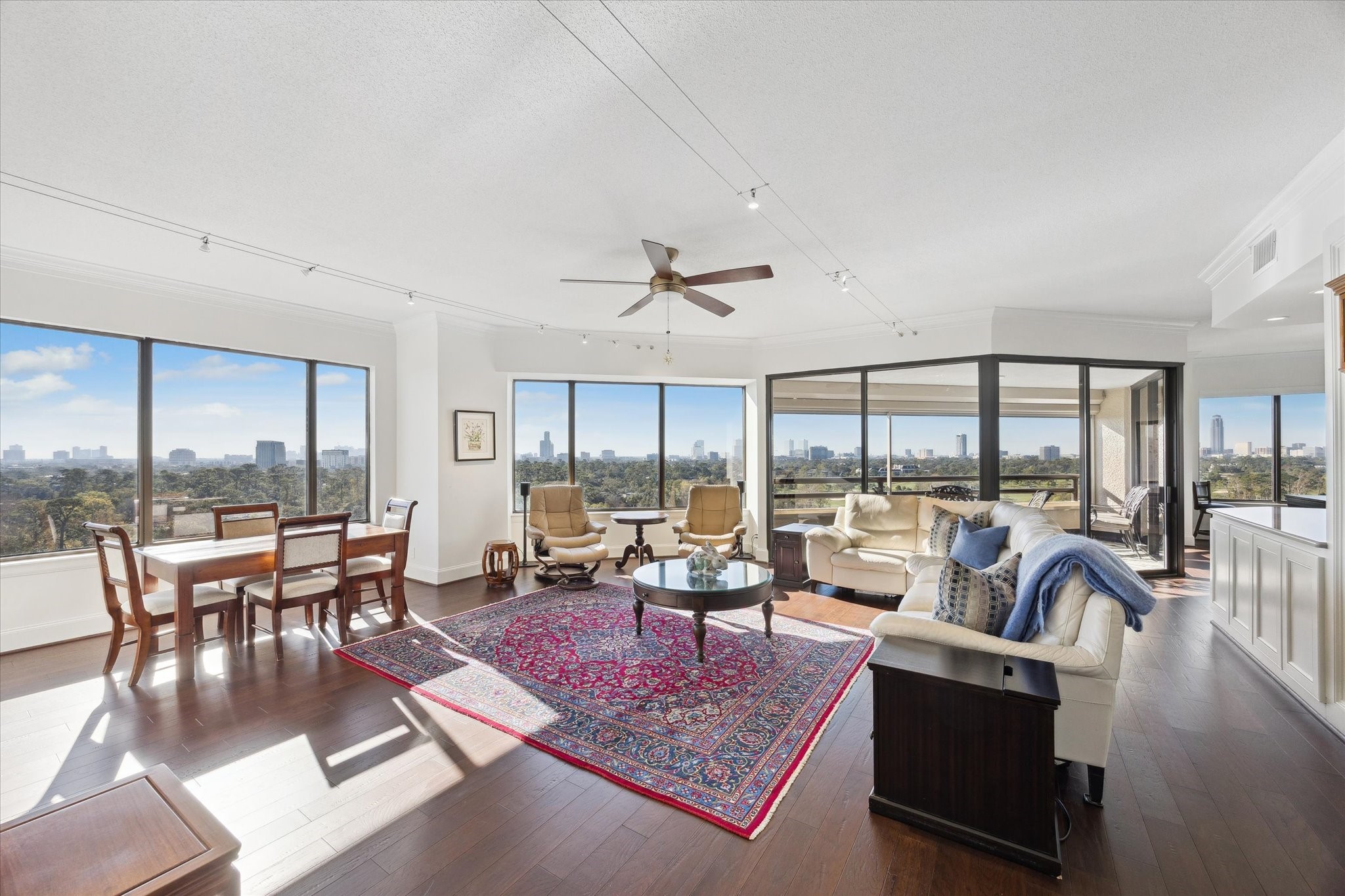 101 Westcott Street, Unit 1202 Houston, TX 77007 - Photo 6 of 38 a living room with lots of furniture and a large window
